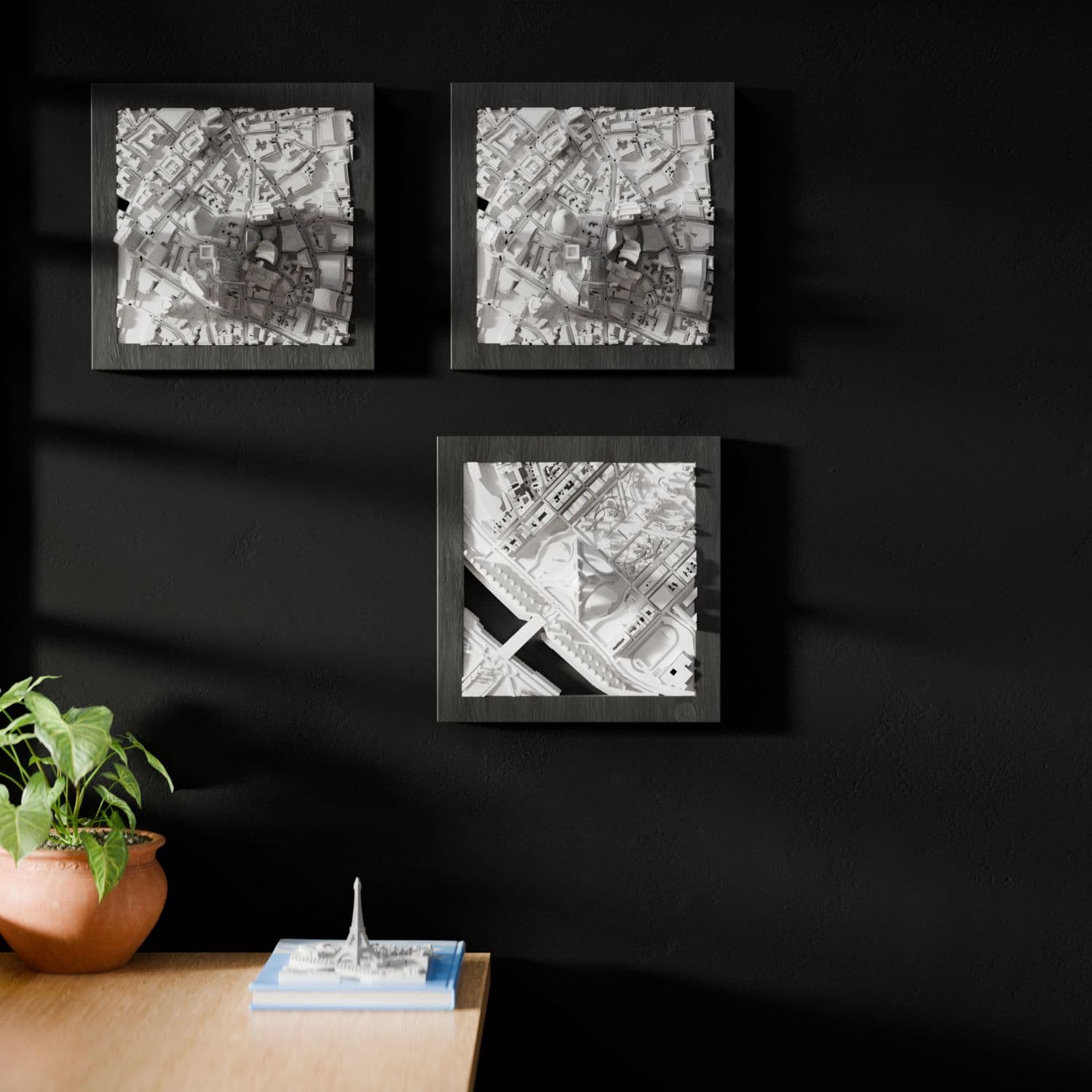 FrameCity framed city models on a gallery wall